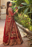 Reddish maroon raw silk lehnga chiffon blouse with a heavy hand worked dupatta.