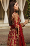 Reddish maroon raw silk lehnga chiffon blouse with a heavy hand worked dupatta.