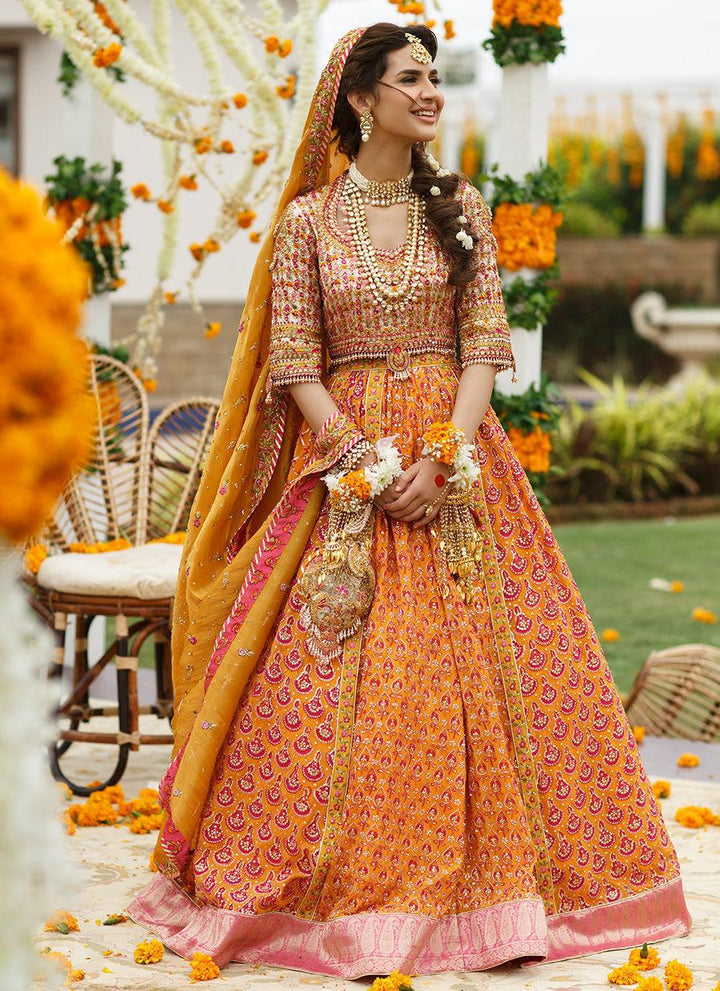 RIHA SAFFRON LEHENGA CHOLI raniazarastudio