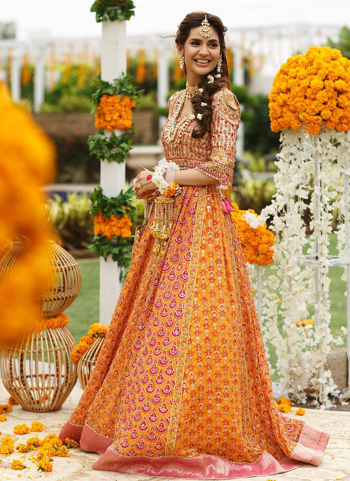 RIHA SAFFRON LEHENGA CHOLI raniazarastudio
