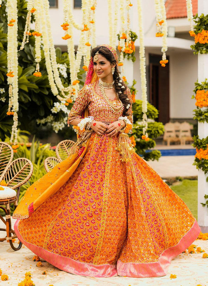 RIHA SAFFRON LEHENGA CHOLI raniazarastudio