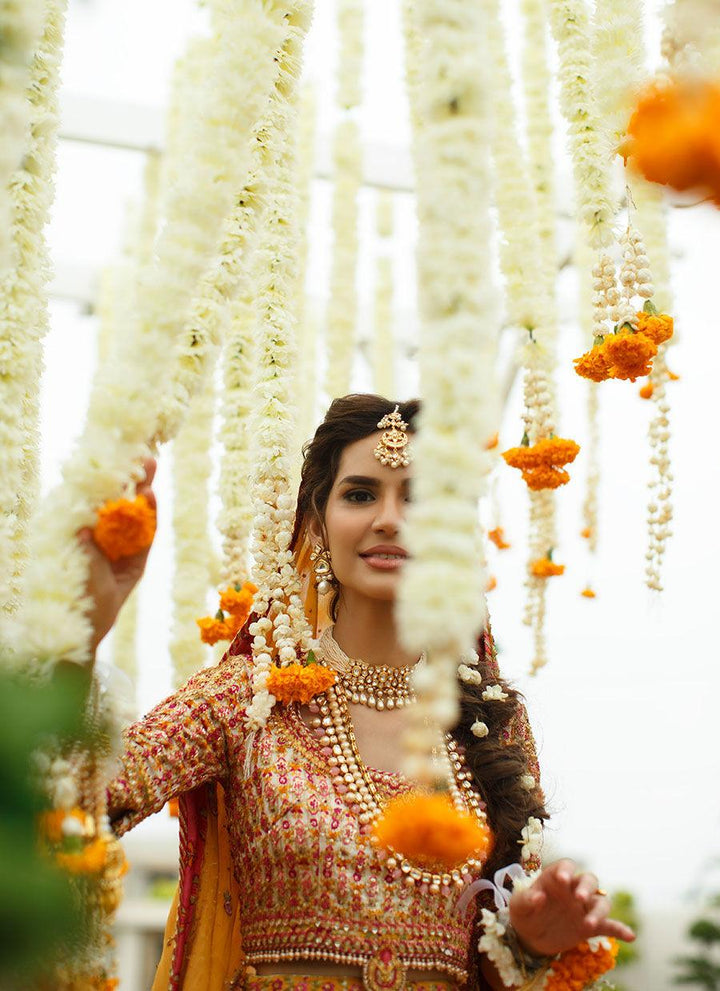 RIHA SAFFRON LEHENGA CHOLI raniazarastudio